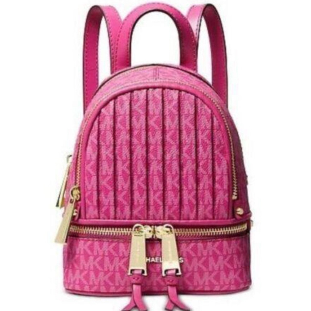 Pink Michael Kors purse backpack